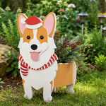 Christmas Corgi dog planter filled with fresh flowers is placed in the garden