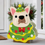 Christmas French Bulldog planter filled with fresh flowers is placed in the garden