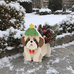 Christmas Shih Tzu dog planter filled with fresh flowers is placed in the garden