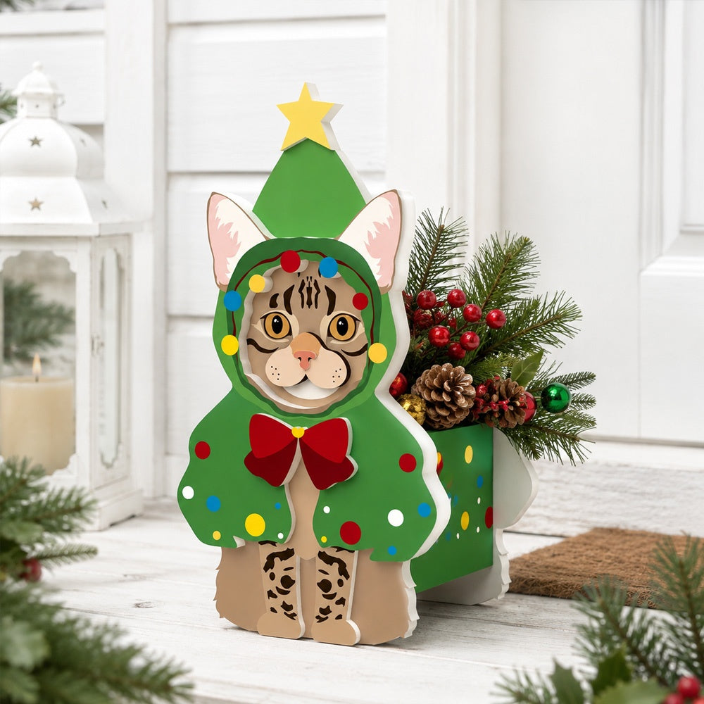 Christmas Tabby Cat planter filled with fresh flowers is placed in the garden