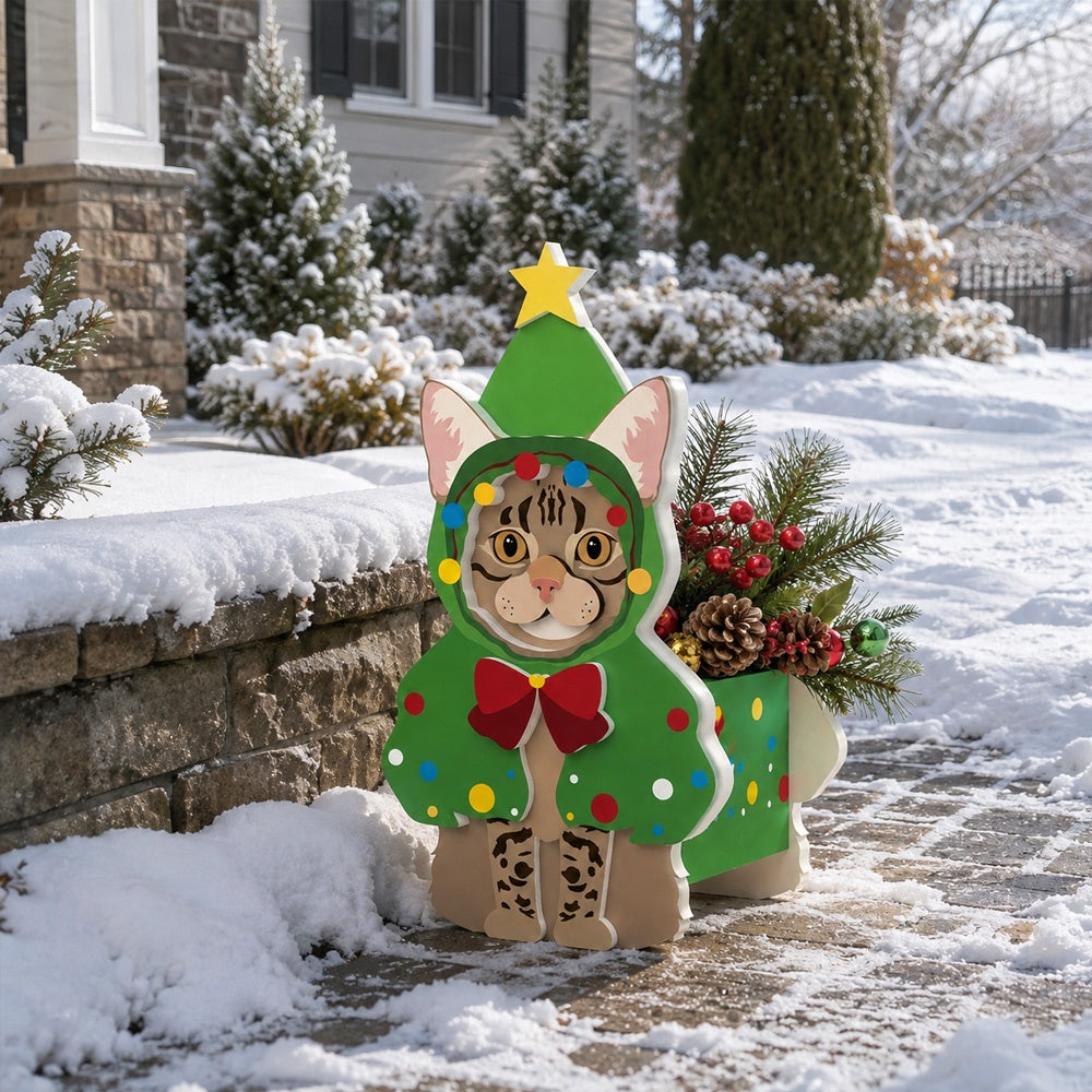 Christmas Tabby Cat planter filled with fresh flowers is placed in the garden