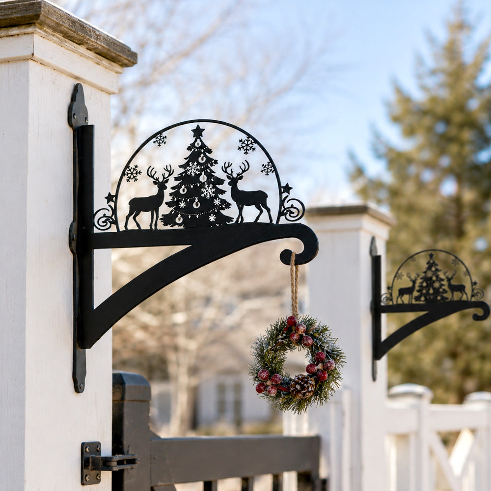 Christmas tree and reindeer metal hanging basket bracket mounted on outdoor wall for plant decoration