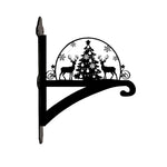 Christmas tree and reindeer metal hanging basket bracket mounted on outdoor wall for plant decoration
