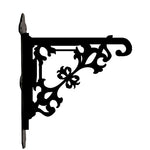 Classic baroque scrollwork metal hanging basket bracket mounted on outdoor wall for plant decoration