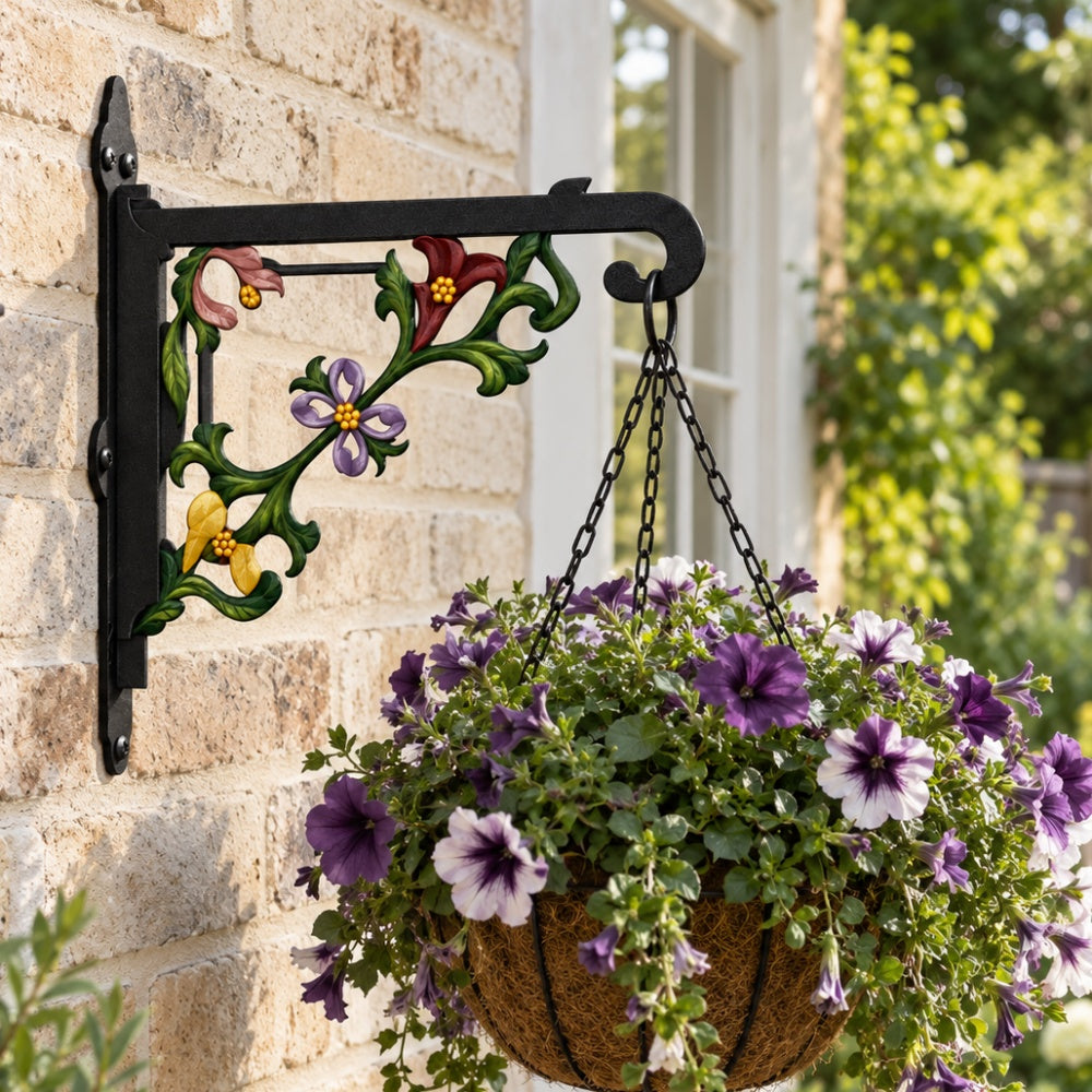 Classic baroque scrollwork metal hanging basket bracket mounted on outdoor wall for plant decoration