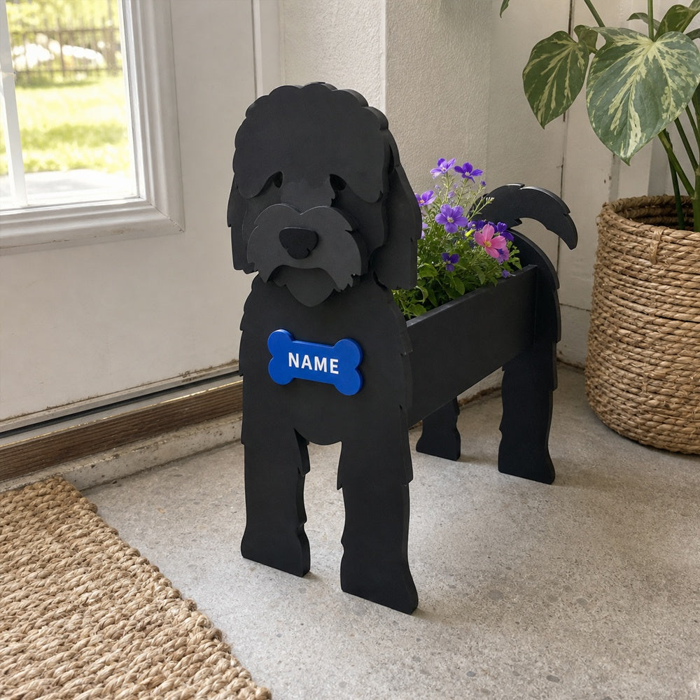Cockapoo dog planter filled with fresh flowers is placed in the garden
