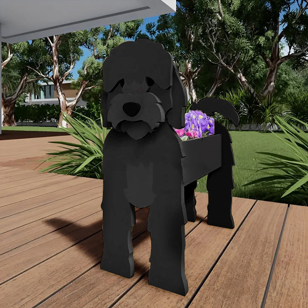 Cockapoo dog planter filled with fresh flowers is placed in the garden