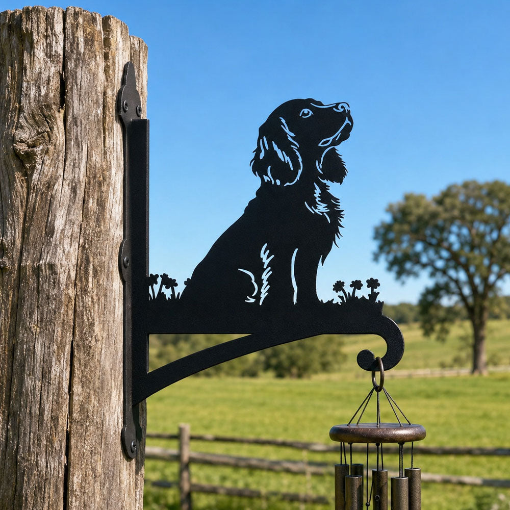 Cocker spaniel metal hanging basket bracket mounted on outdoor wall for plant decoration
