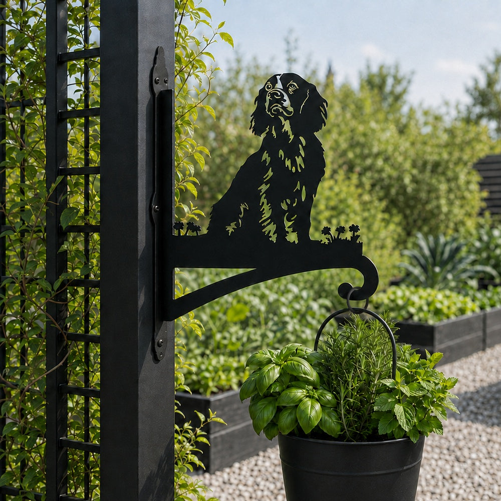 Cocker spaniel metal hanging basket bracket mounted on outdoor wall for plant decoration