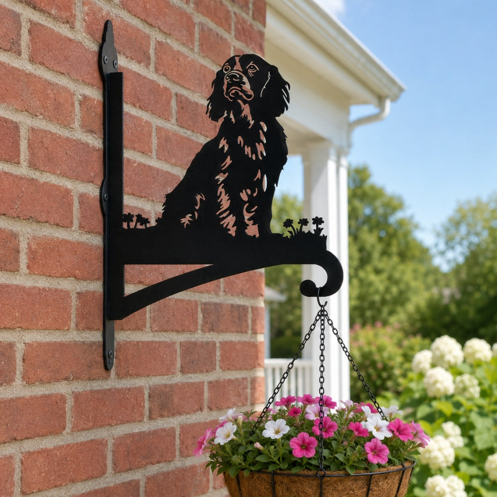 Cocker spaniel metal hanging basket bracket mounted on outdoor wall for plant decoration