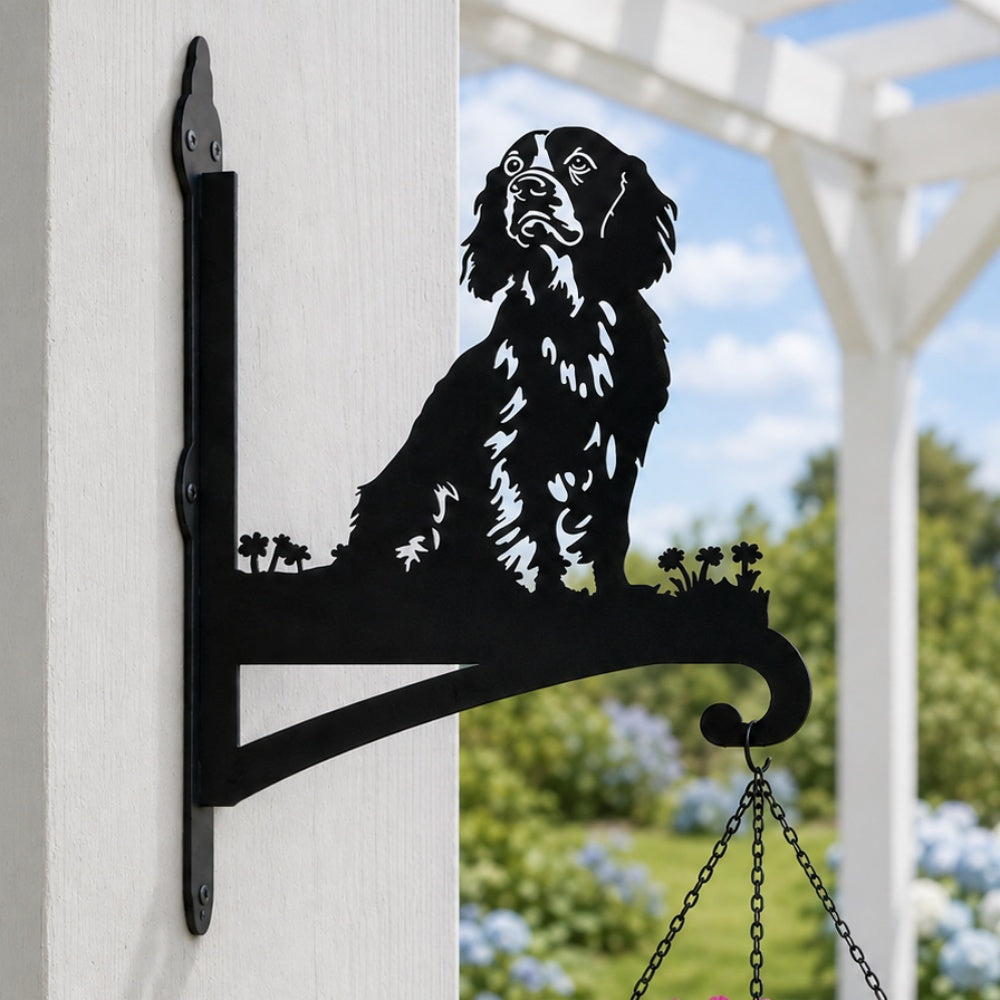 Cocker spaniel metal hanging basket bracket mounted on outdoor wall for plant decoration