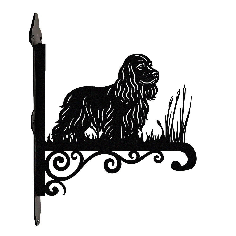 Cocker spaniel metal hanging basket bracket mounted on outdoor wall for plant decoration