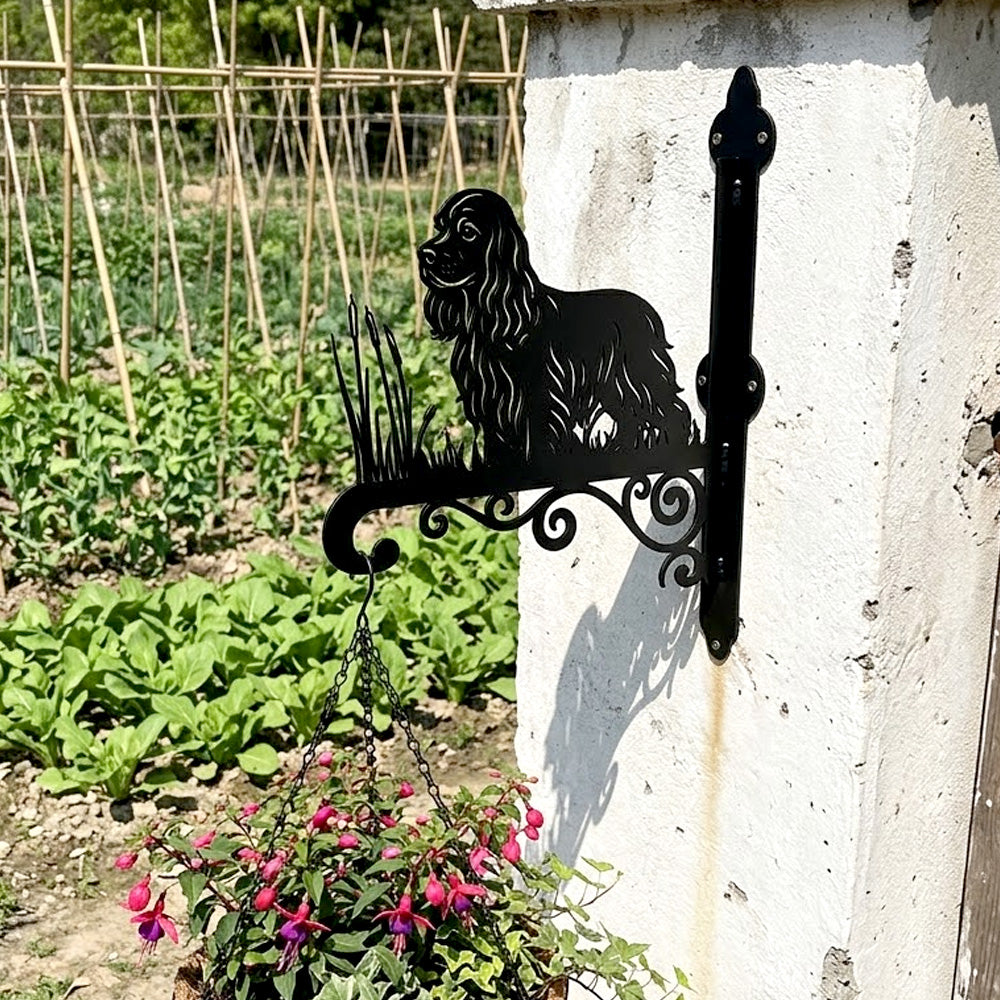 Cocker spaniel metal hanging basket bracket mounted on outdoor wall for plant decoration
