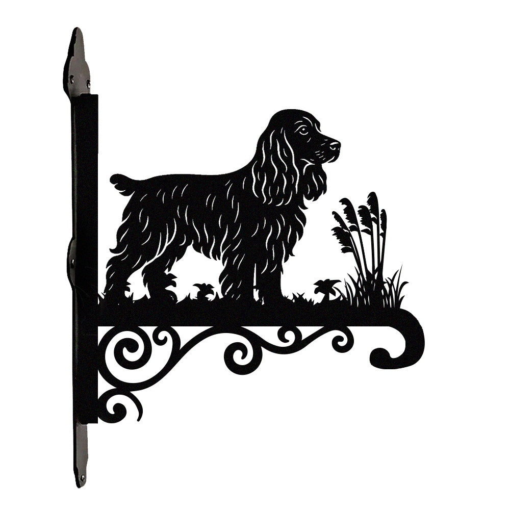 Cocker spaniel metal hanging basket bracket mounted on outdoor wall for plant decoration