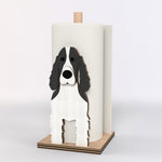 Cocker Spaniel Wooden Dog Paper Towel Holder displayed on a kitchen countertop with a freestanding paper towel roll