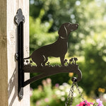 Dachshund metal hanging basket bracket mounted on outdoor wall for plant decoration