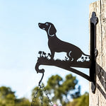 Dachshund metal hanging basket bracket mounted on outdoor wall for plant decoration