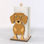 Dachshund Wooden Dog Paper Towel Holder displayed on a kitchen countertop with a freestanding paper towel roll