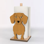 Dachshund Wooden Dog Paper Towel Holder displayed on a kitchen countertop with a freestanding paper towel roll