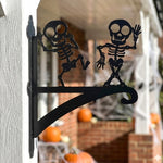 Dancing skeletons metal hanging basket bracket mounted on outdoor wall for plant decoration