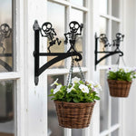 Dancing skeletons metal hanging basket bracket mounted on outdoor wall for plant decoration