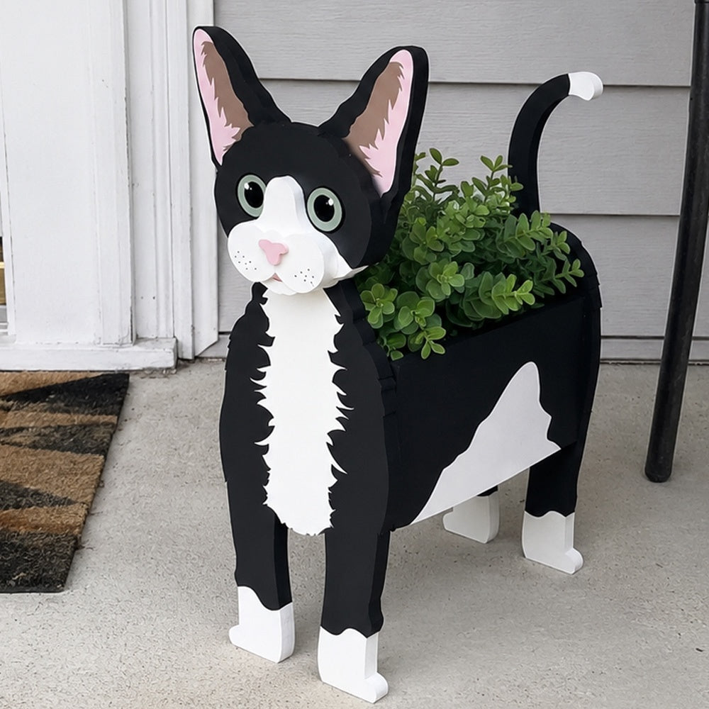 Devon Rex cat planter filled with fresh flowers is placed in the garden