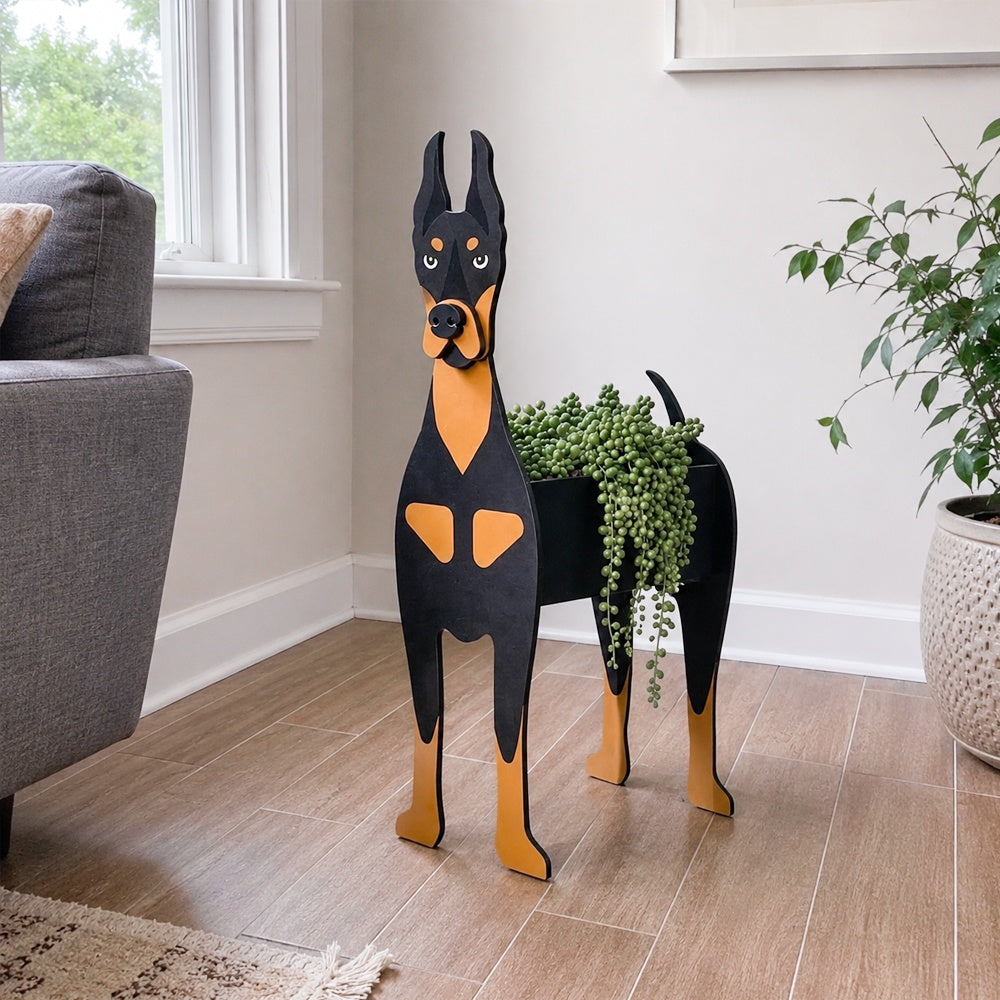 Doberman dog planter filled with fresh flowers is placed in the room.