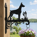 Doberman pinscher metal hanging basket bracket mounted on outdoor wall for plant decoration