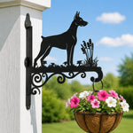Doberman pinscher metal hanging basket bracket mounted on outdoor wall for plant decoration