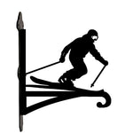 Downhill skier metal hanging basket bracket mounted on outdoor wall for plant decoration