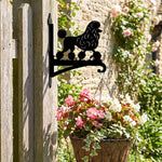 Poodle metal hanging basket bracket mounted on outdoor wall for plant decoration