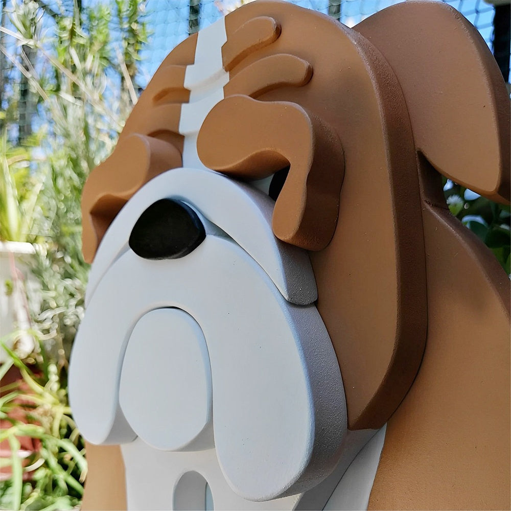 English Bulldog planter filled with fresh flowers is placed in the garden