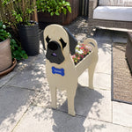 English Mastiff Planter dog planter filled with fresh flowers is placed in the garden