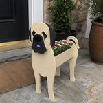 English Mastiff Planter dog planter filled with fresh flowers is placed in the garden
