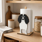 English Springer Spaniel Wooden Dog Paper Towel Holder displayed on a kitchen countertop with a freestanding paper towel roll