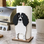 English Springer Spaniel Wooden Dog Paper Towel Holder displayed on a kitchen countertop with a freestanding paper towel roll