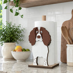 English Springer Spaniel Wooden Dog Paper Towel Holder displayed on a kitchen countertop with a freestanding paper towel roll