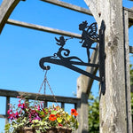 Fairy and angel metal hanging basket bracket mounted on outdoor wall for plant decoration