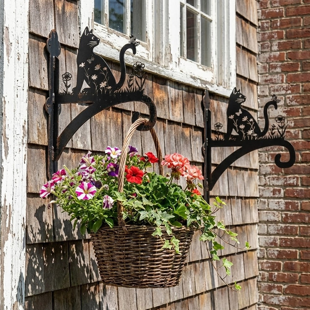 Floral cat and butterfly metal hanging basket bracket mounted on outdoor wall for plant decoration