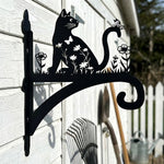 Floral cat and butterfly metal hanging basket bracket mounted on outdoor wall for plant decoration