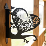 Floral heart metal hanging basket bracket mounted on outdoor wall for plant decoration