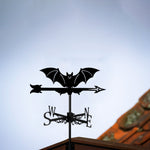 Flying bat metal weather vane with directional arrows and mounting rod, outdoor roof and garden decoration