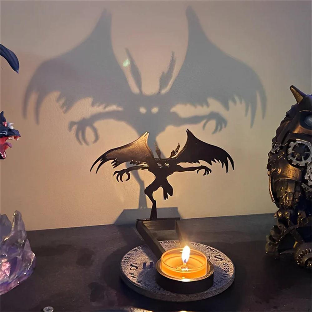 Flying dragon halloween metal candle holder casting a spooky shadow on the wall