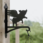 Flying pig metal hanging basket bracket mounted on outdoor wall for plant decoration