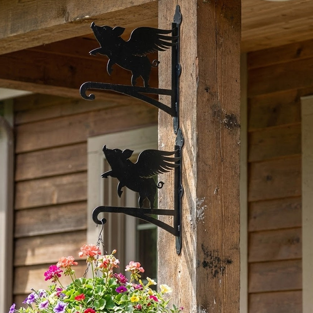 Flying pig metal hanging basket bracket mounted on outdoor wall for plant decoration