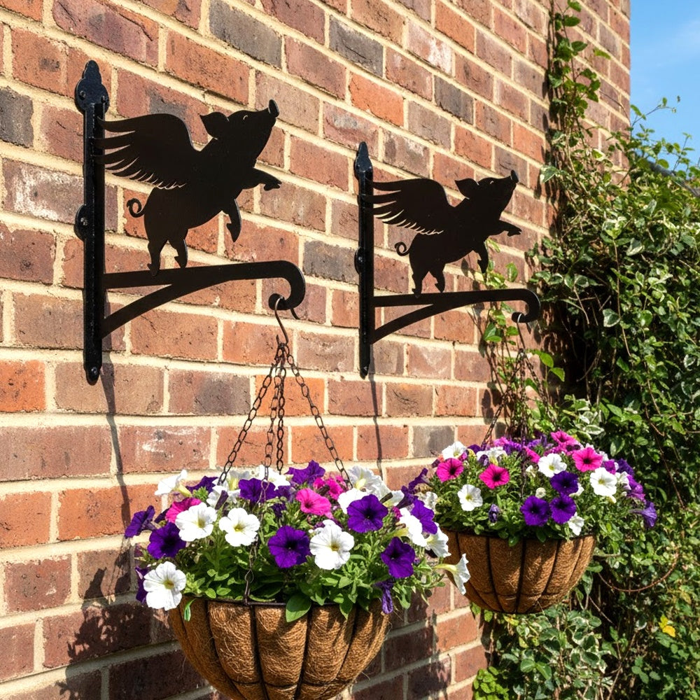 Flying pig metal hanging basket bracket mounted on outdoor wall for plant decoration