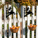 Flying witch and castle metal hanging basket bracket mounted on outdoor wall for plant decoration