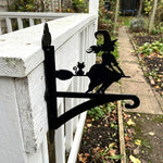 Flying witch and cat metal hanging basket bracket mounted on outdoor wall for plant decoration