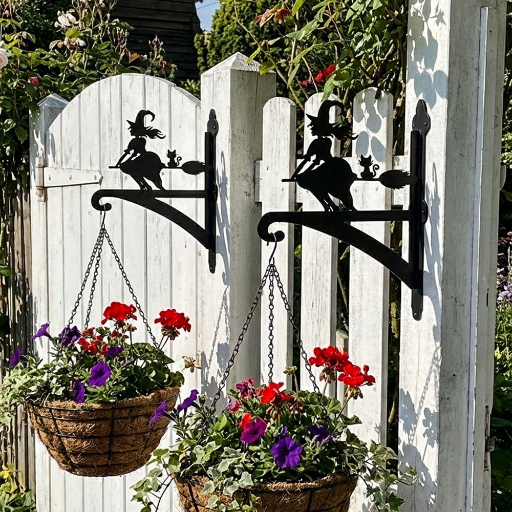 Flying witch and cat metal hanging basket bracket mounted on outdoor wall for plant decoration