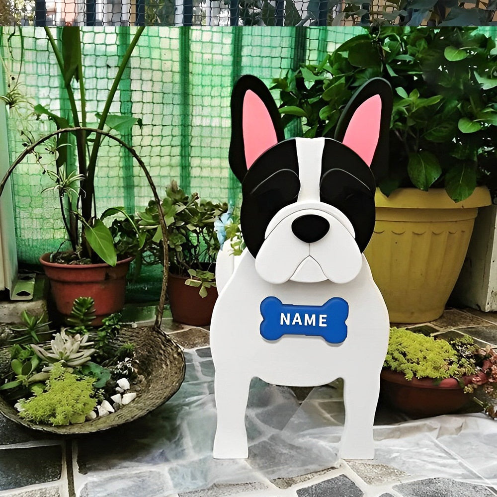 French Bulldog planter filled with fresh flowers is placed in the garden.